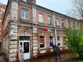 В центре Курска демонтируют незаконную пристройку к старинному зданию