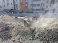 На дороге к строящейся школе на проспекте Н. Плевицкой перешли к укладке асфальтобетонного покрытия