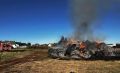 В Курской области на поле горели 150 тюков сена